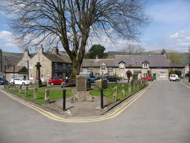 Castleton's village green, with the war memorial and surrounding hills