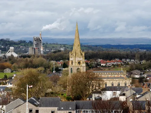Clitheroe's parish church spire, with the surrounding valley behind