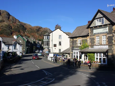 Coniston village, with the fells behind and the Yewdale Inn on the right