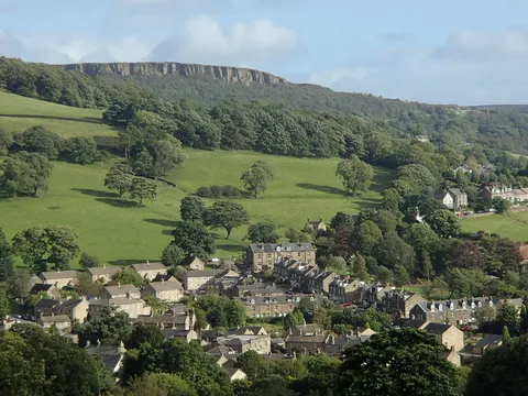 Hathersage seen from above, with the gritstone edge behind