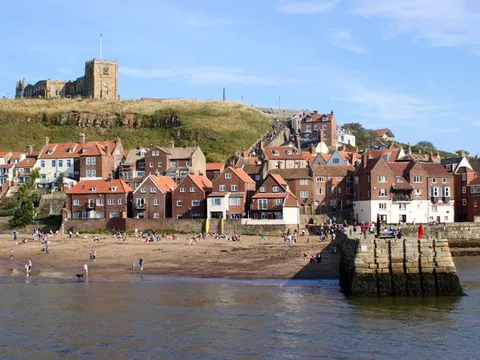 The 199 steps up to Whitby Abbey, with the harbour and beach below